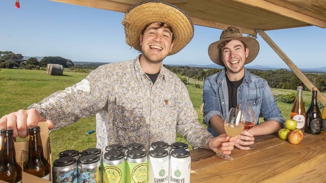 Gurneys Cider is a family-run farm and cidery in Gippsland. Tom and James Gurnett sample the Noir Cider. Picture: Tim Carrafa.