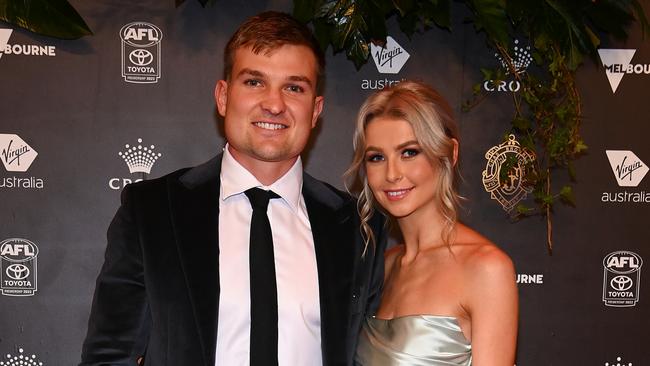 MELBOURNE, AUSTRALIA - SEPTEMBER 18: Ollie Wines and partner Olivia May attend the 2022 Brownlow Medal at Crown Entertainment Complex on September 18, 2022 in Melbourne, Australia. (Photo by Quinn Rooney/Getty Images)