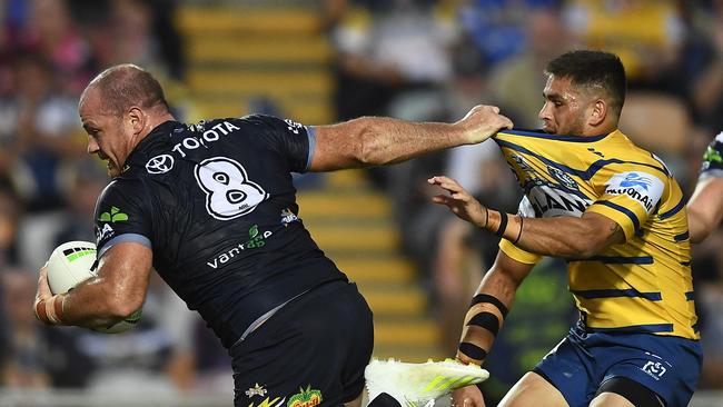 TOWNSVILLE, AUSTRALIA - MAY 18: Matt Scott of the Cowboys makes a break during the round 10 NRL match between the North Queensland Cowboys and the Parramatta Eels at 1300SMILES Stadium on May 18, 2019 in Townsville, Australia. (Photo by Ian Hitchcock/Getty Images)