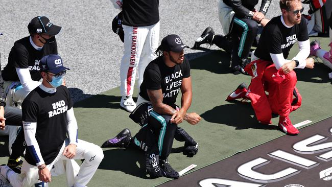 Lewis Hamilton, Pierre Gasly and other F1 drivers take the knee on the grid in support of the Black Lives Matter movement ahead of the Austrian Grand Prix. Picture: Getty Images.