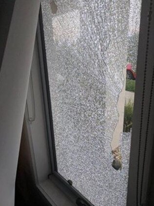 A window smashed during a wild party in Werribee Picture: supplied