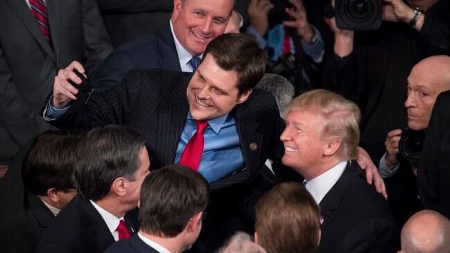 Donald Trump poses for a selfie with Matt Gaetz after delivering the 2018 State of the Union address. Picture: Tom Williams/CQ Roll Call/Getty Images