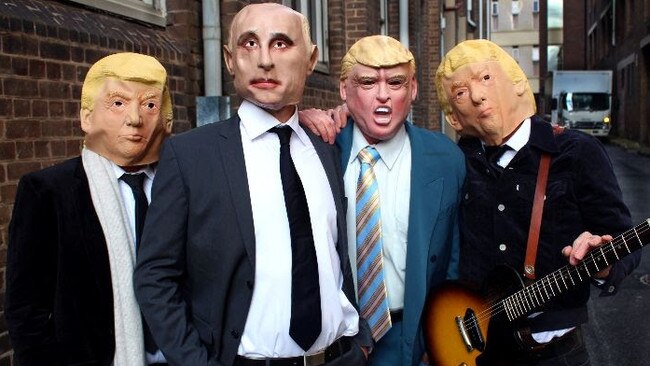 Sydney rock band Hoodoo Gurus in masks while recording the music video for Hung Out to Dry, which takes aim at President Donald Trump. Picture: supplied.