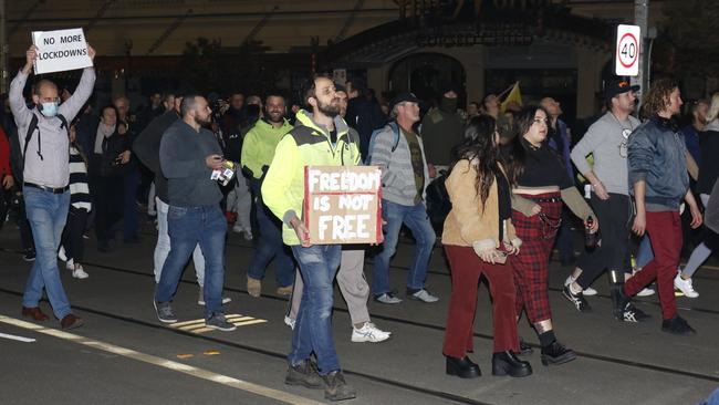 Protesters march through Melbourne’s CBD. Picture: MatrixNews