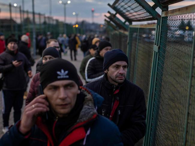 Ukrainian citizens are seen arriving at the Medyka pedestrian border crossing in eastern Poland. Picture: AFP