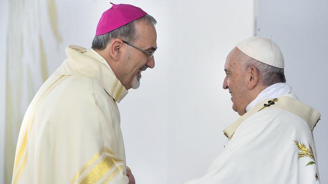 Pizzaballa and pope Francis celebrate mass at Nicosia's main football stadium, in the Cypriot capital in December 2021. Picture: Getty Images