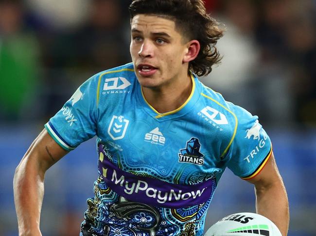 GOLD COAST, AUSTRALIA - JUNE 02: Jayden Campbell of the Titans runs the ball during the round 13 NRL match between the Gold Coast Titans and the North Queensland Cowboys at Cbus Super Stadium, on June 02, 2022, in Gold Coast, Australia. (Photo by Chris Hyde/Getty Images)