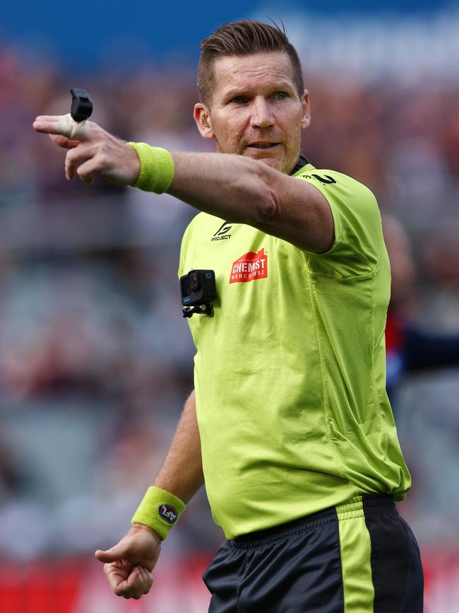 Umpire Simon Meredith.
