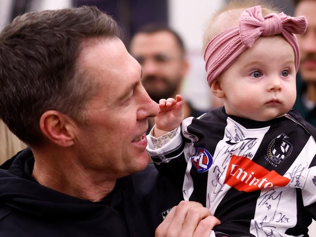 ADELAIDE, AUSTRALIA - APRIL 07: Craig McRae, Senior Coach of the Magpies is seen with daughter Maggie after the 2024 AFL Round 04 match between the Collingwood Magpies and the Hawthorn Hawks at Adelaide Oval on April 07, 2024 in Adelaide, Australia. (Photo by Michael Willson/AFL Photos via Getty Images)