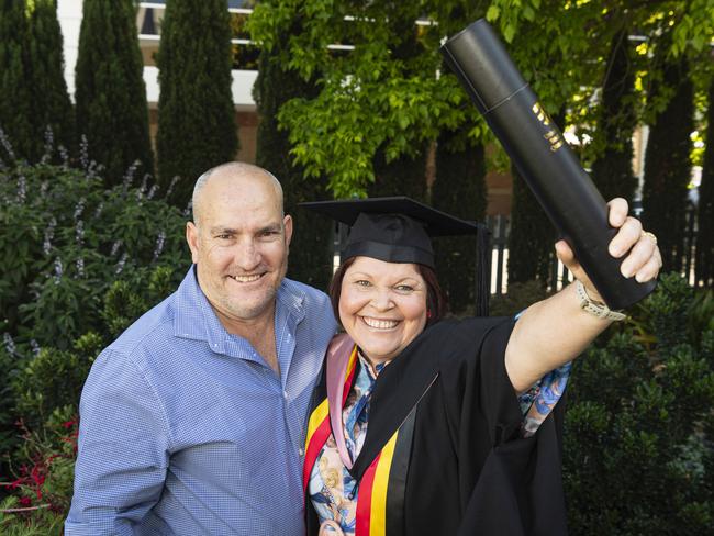 Master of Learning and Teaching (Early Childhood) graduate Jayne Gothmann celebrates with Greg Gothmann at a UniSQ graduation ceremony at The Empire, Tuesday, October 29, 2024. Picture: Kevin Farmer