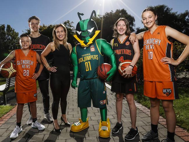 Kristie Johnston, third from left, during her time as Glenorchy Mayor with the Jack Jumpers’ mascot and basketballers, from left, Tyler Dingjan, Jack Stanwix, Aimee Barnett, and Molly Green. Picture: Zak Simmonds