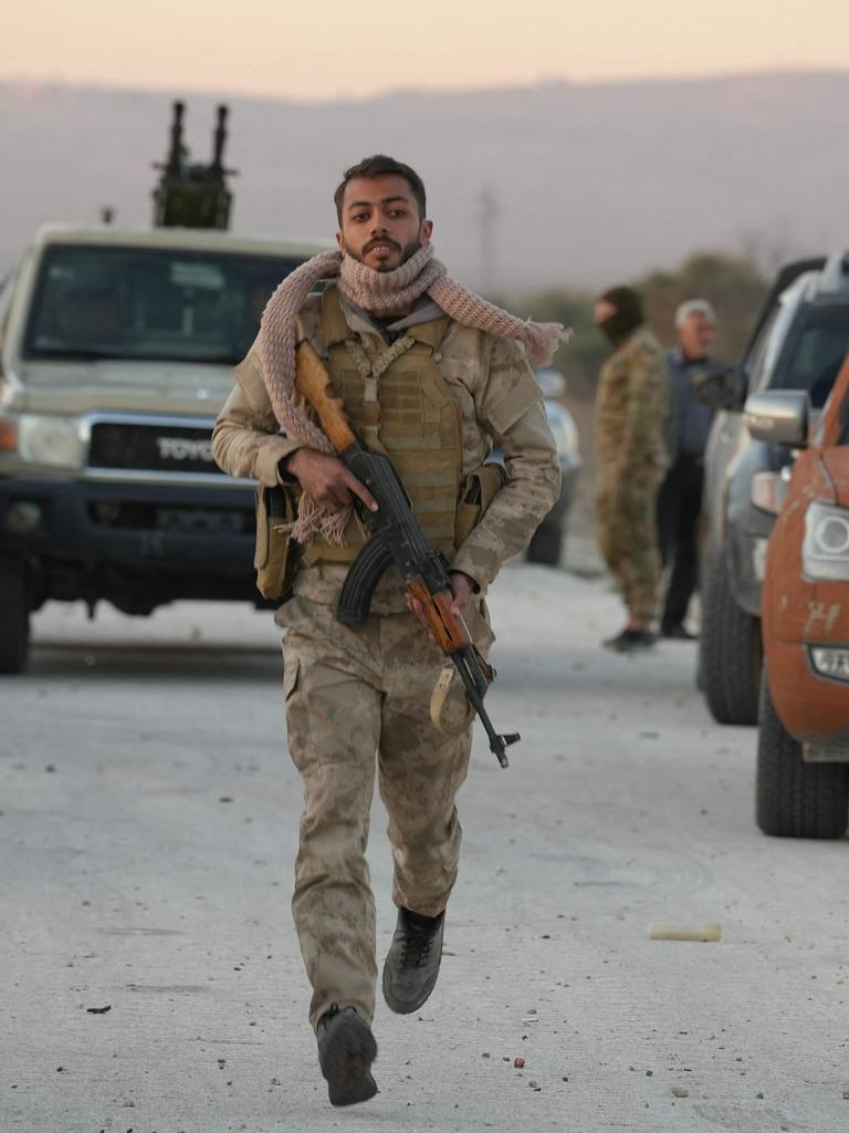 Anti-government fighters reach the highway near the the northern Syrian town of Azaz. Picture: Rami al Sayed/AFP