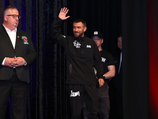 Lomachenko waves to the crowd after arriving fashionably late. Picture: Mikey Williams/Top Rank