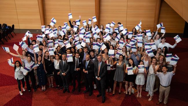 Education Minister Rob Stokes pictured with HSC students who received certificates for excellence. Picture: Monique Harmer