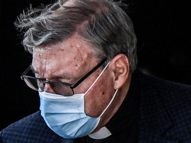 Australian Cardinal George Pell gets into a car after landing at Rome's Fiumicino airport on September 30, 2020, returning for the first time since being acquitted of sexual abuse charges. - Pell arrived from Sydney to Rome on September 30, 2020 on a "private visit", just six months after Australia's High Court quashed his conviction on charges of molesting two choirboys in the 1990s. (Photo by Alberto PIZZOLI / AFP)