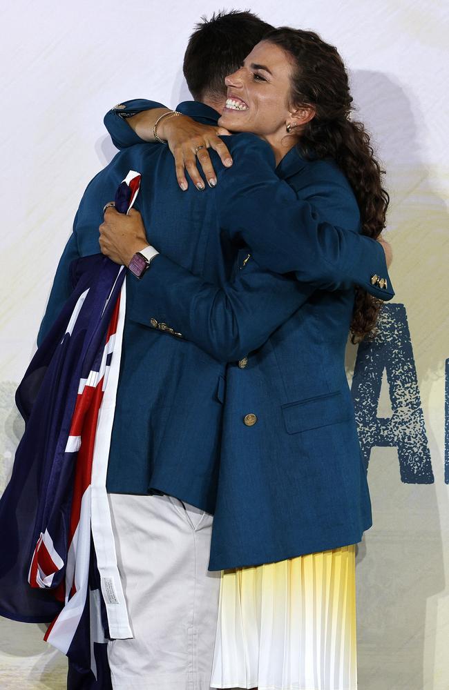 Eddie Ockenden and Jess Fox embrace. Picture: Michael Klein