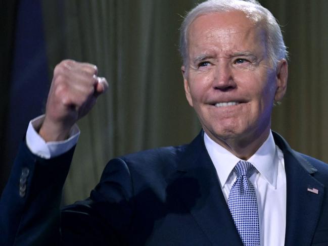 US President Joe Biden gestures on stage at the Washington Hilton in Washington, DC, April 25, 2023. - Biden announced Tuesday his bid "to finish the job" with re-election in 2024. (Photo by Jim WATSON / AFP)