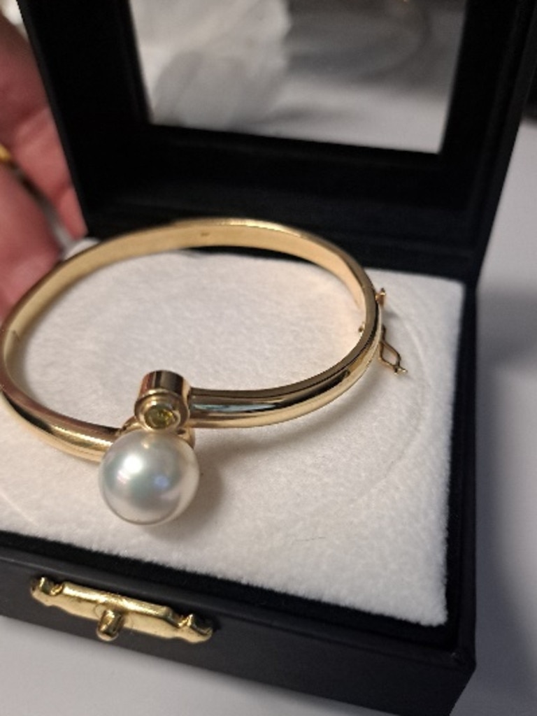 This jewellery set was found in a filing cabinet after a burglary in Toowoomba and believed to have been drop by the offenders in their haste.