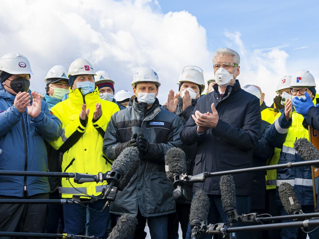 Moscow Mayor Sergei Sobyanin, foreground right, attends an opening ceremony of the new infectious diseases hospital on the outskirts of Moscow. Picture: AP