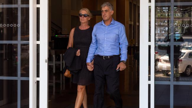 Peter Bravos leaving court with wife Cindy. Picture: Che Chorley