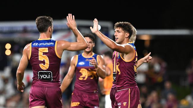 IPSWICH, AUSTRALIA - FEBRUARY 27: Zac Bailey of the Lions celebrates kicking a goal during the 2025 AAMI AFL Community Series match between Brisbane Lions and Adelaide Crows at Brighton Homes Arena on February 27, 2025 in Ipswich, Australia. (Photo by Bradley Kanaris/Getty Images)