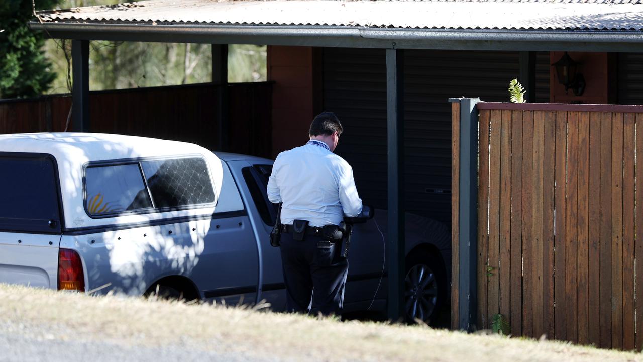 Police at the home where Matthew Berry’s body was found. Picture: Nigel Hallett