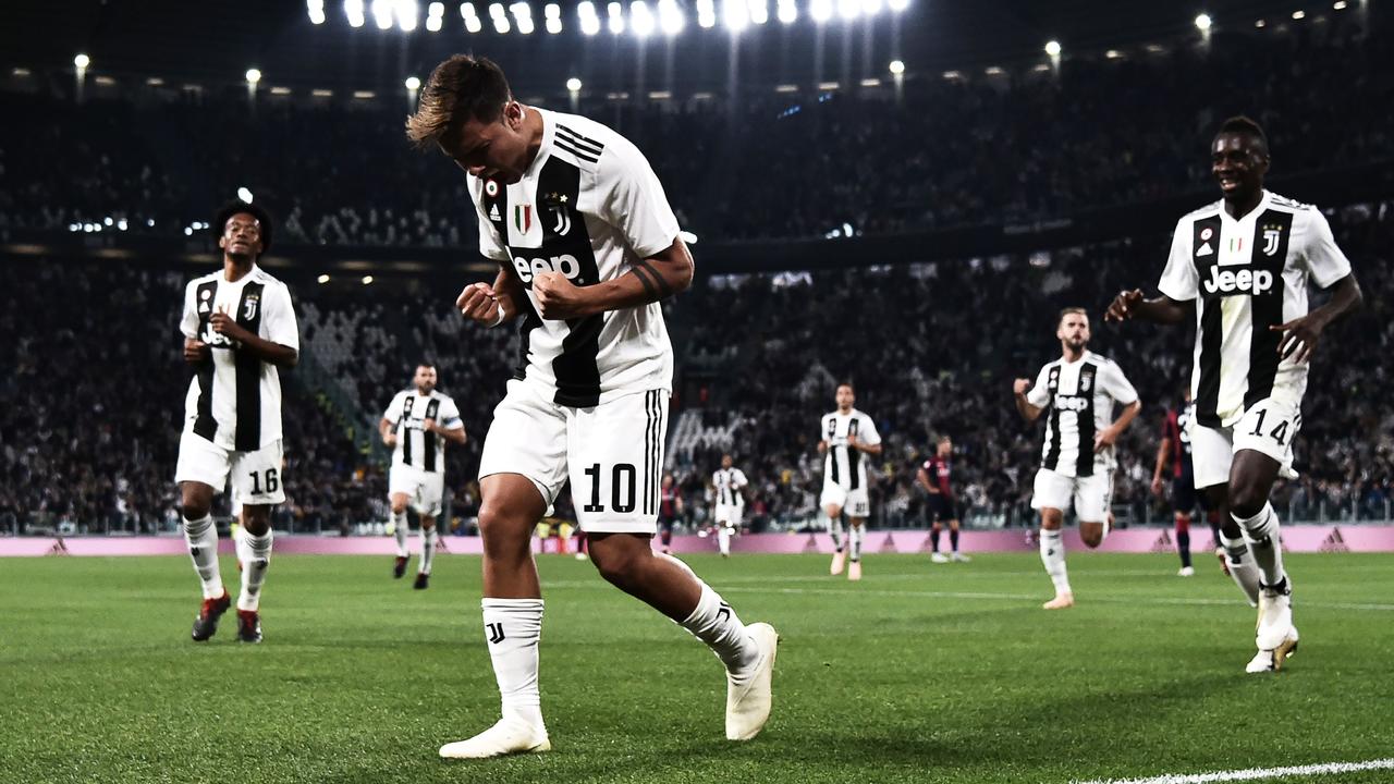 Turin, Italy - 26 June, 2020: Paulo Dybala (C) of Juventus FC celebrates  with Cristiano Ronaldo (R) and Federico Bernardeschi (L) of Juventus FC  after scoring a goal during the Serie A