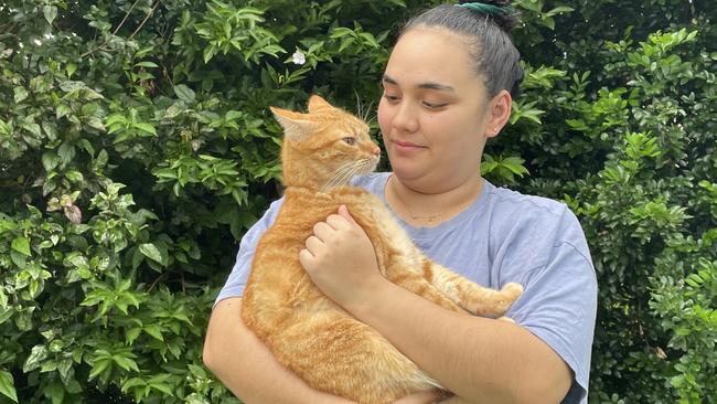 Tiara Richardson is raising funds to help cover ongoing vet bills for her two-year-old tabby cat Milo, who was diagnosed with melioidosis, a bacteria-borne disease which can be fatal for domestic pets. Photo: Catherine Duffy.