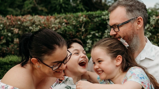 Emmett Dollisson, 9, with mum Naomi, dad Ben and sister Poppy, 7. Picture: Supplied