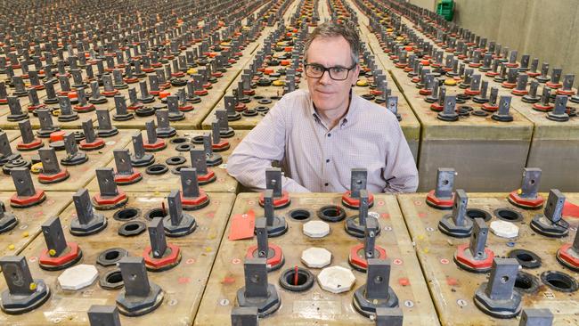 PMB Defence chief executive Stephen Faulkner with a submarine battery, currently in production at Osborne for the Canadian Navy. Picture: NCA NewsWire/Brenton Edwards