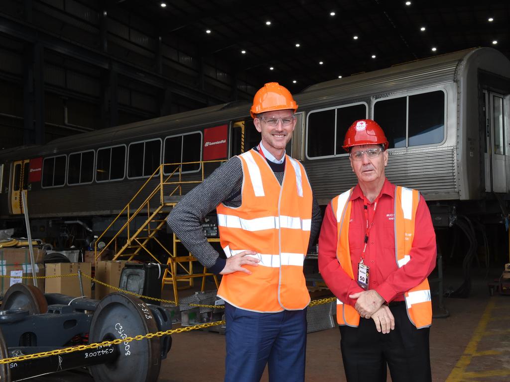 DOWNER FIX UP: Maryborough MP Bruce Saunders and Main Roads Minister Mark Bailey at the Downer EDI factory in Maryborough.