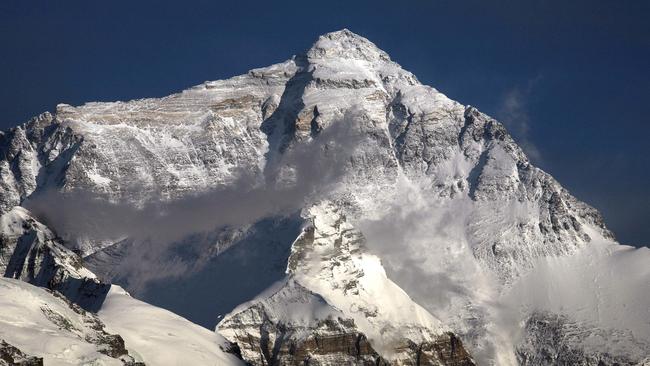 Last year, 18 people lost their lives on Mt Everest, including Australian Jason Kennison, 40, who died while he was on his way down after reaching the peak. Picture: AFP PHOTO/Greenpeace/John Novis