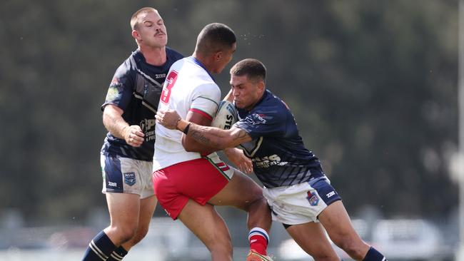 Will Smith (right) was one of three former NRL players taking part in the final. Picture: Sue Graham