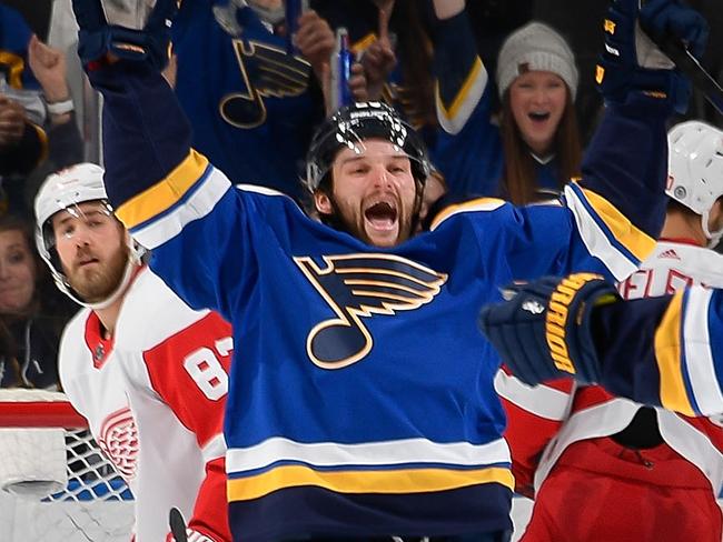 ST. LOUIS, MO - DECEMBER 9: Nathan Walker #26 of the St. Louis Blues reacts after scoring his third goal of the game against the Detroit Red Wings at the Enterprise Center on December 9, 2021 in St. Louis, Missouri. (Photo by Scott Rovak/NHLI via Getty Images)