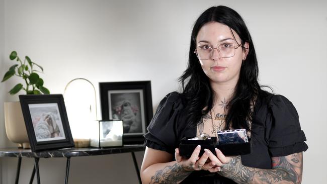 Haylee Loccisano, holding her daughter Celeste’s urn. The unborn baby was killed in a car crash at Ipswich. Picture: Steve Pohlner