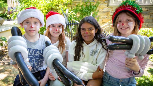 Ethan 9yrs, Ava 11yrs, Nyzzariyah 11yrs and Tenaish 11yrs at KickStart For Kids Christmas Party hosted by Bird In Hand Winery in Woodside, SA. Picture: Emma Brasier