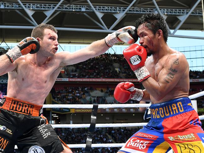 Manny Pacquiao on the receiving end of Jeff Horn. Picture: Dave Hunt/AAP