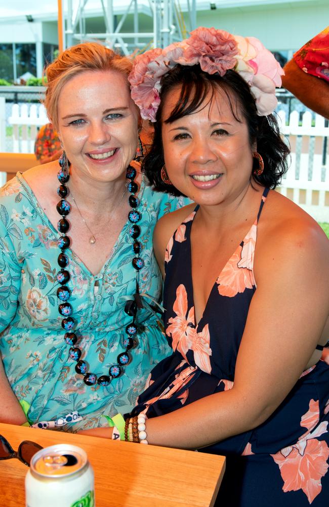 Kristyn Dougan from Ooralea and Sandra Braxton from South Mackay at the Hawaiian Christmas Race Day. Mackay Turf Club, Ooralea. Picture: Michaela Harlow
