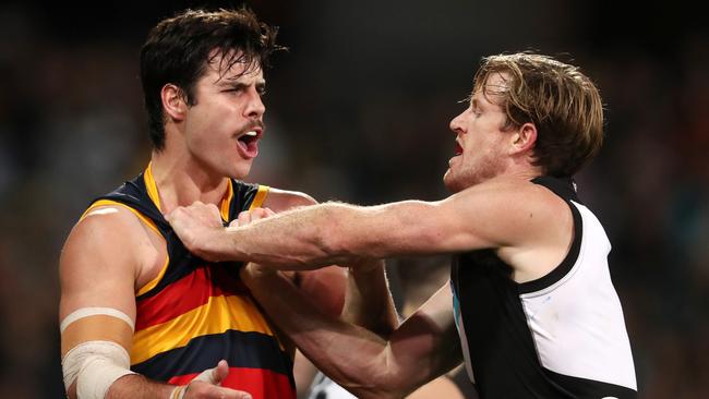 Darcy Fogarty and Tom Jonas on Saturday night. Picture: Sarah Reed/AFL Photos