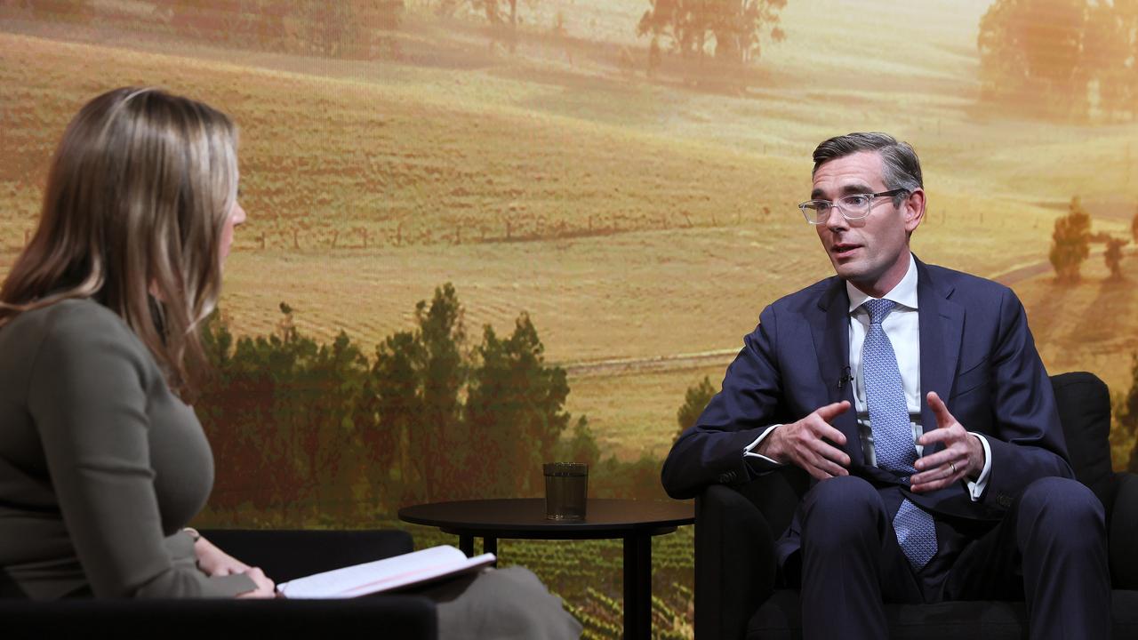 Daily Telegraph deputy editor Anna Caldwell and NSW Treasurer Dominic Perrottet. Picture: Toby Zerna