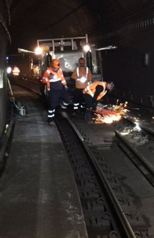 Sydney Trains engineers repair a cracked rail at Town Hall which caused chaos this morning. Picture: Twitter/@TrainsInfo