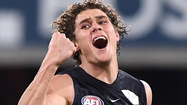 Charlie Curnow of the Blues reacts after kicking a goal during the Round 19 AFL match between the Gold Coast Suns and the Carlton Blues at Metricon Stadium at Carrara on the Gold Coast, Saturday, July 28, 2018. (AAP Image/Dave Hunt) NO ARCHIVING, EDITORIAL USE ONLY