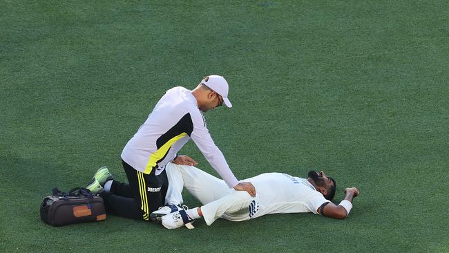 Jasprit Bumrah receiving treatment during the second Test at Adelaide Oval. (Photo by Robert Cianflone/Getty Images)