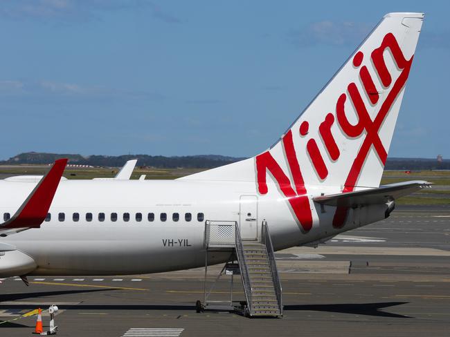 SYDNEY, AUSTRALIA - SEPTEMBER 23, 2020:  Virgin Planes seen at Terminal 2 in the Sydney Domestic Airport in Sydney, Australia, on SEPTEMBER 23 2020. Picture: NCA Newswire / Gaye Gerard