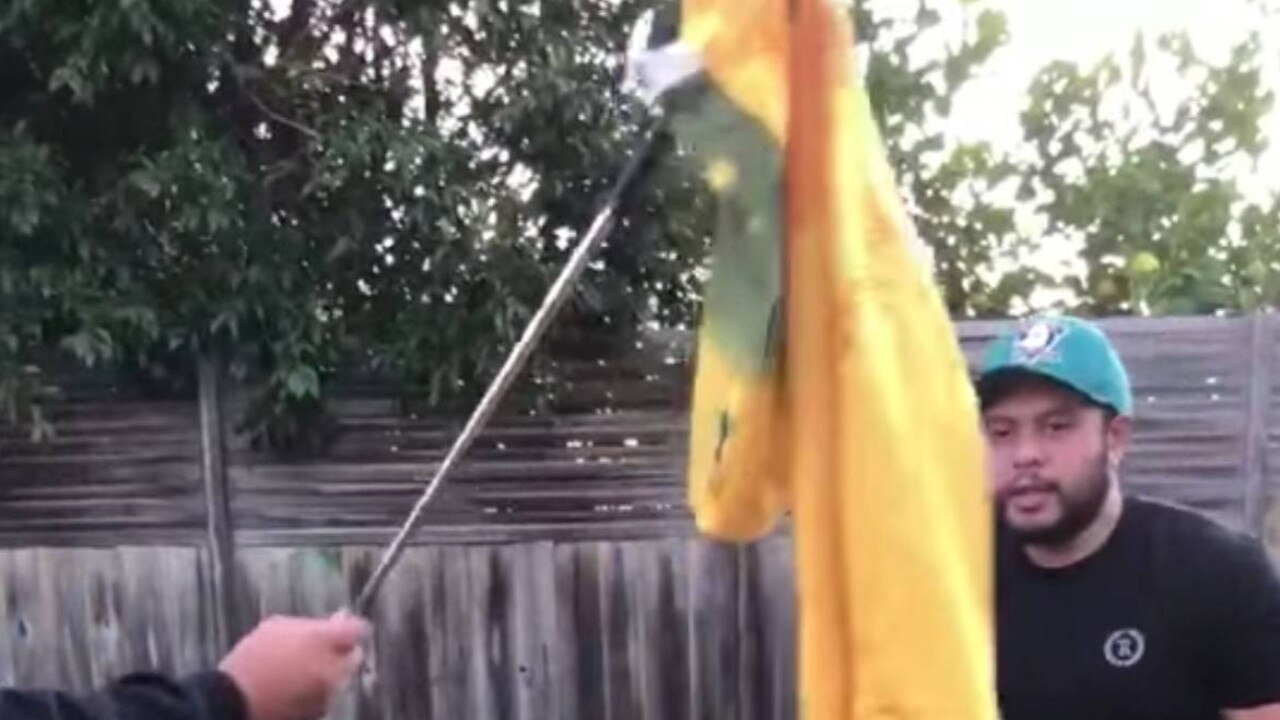 The Wallabies fan prepares to torch his jersey.