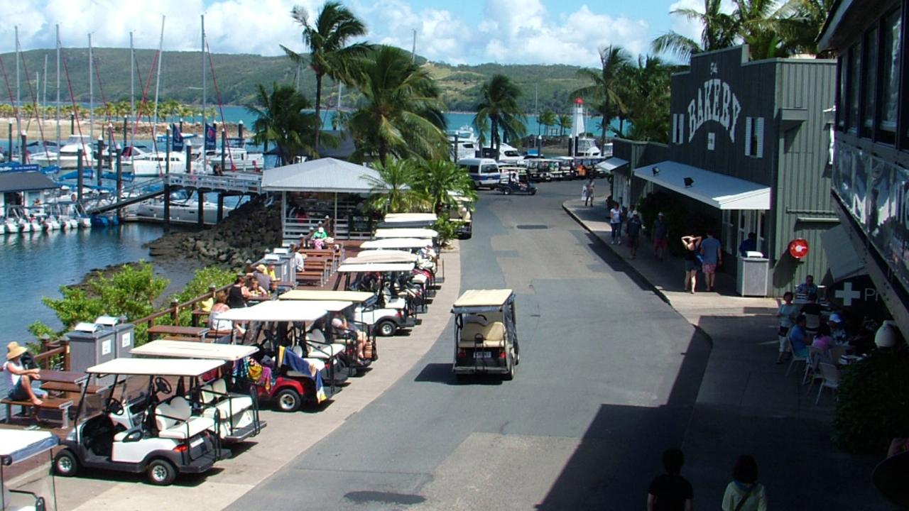 Some of Hamilton Island's huge fleet of buggies parked at the marina. Picture: AAP Image/David Potts