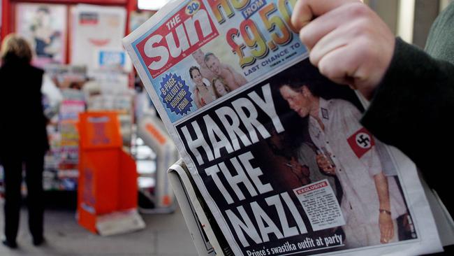 Prince Harry was embroiled in global controversy when he wore a swastika. Picture: AFP PHOTO.