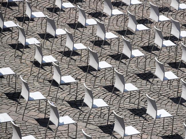 Restaurant chairs stand in Frankfurt during a nationwide protest by restaurateurs wanting to reopen in Germany. Picture: Getty