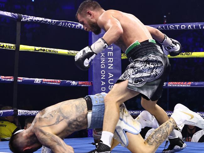 Lomachenko floors Kambosos in the 11th round. Picture: Top Rank/Mikey Williams