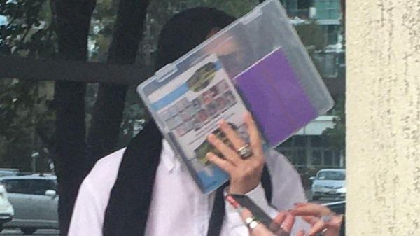 Vivienne Mary Glover waiting for a car outside Maroochydore District Court on Friday. Picture: Laura Pettigrew.